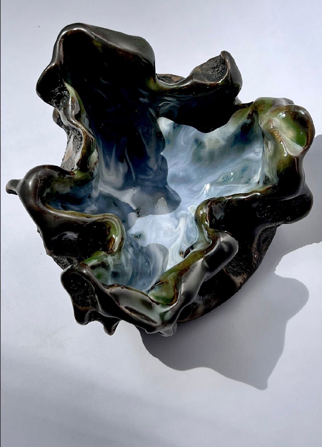 Phantom Love material contrast — volcanic Lava bowl form.