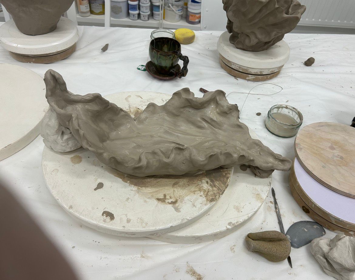 Undamalanta — large raw clay horizontal form in progress.